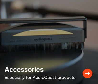 A record cleaning brush labelled "AudioQuest" runs over a vinyl record. Text reads, "Accessories, Especially for AudioQuest products," with an orange arrow icon.